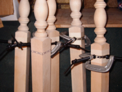 Inlay added and clamped on balusters